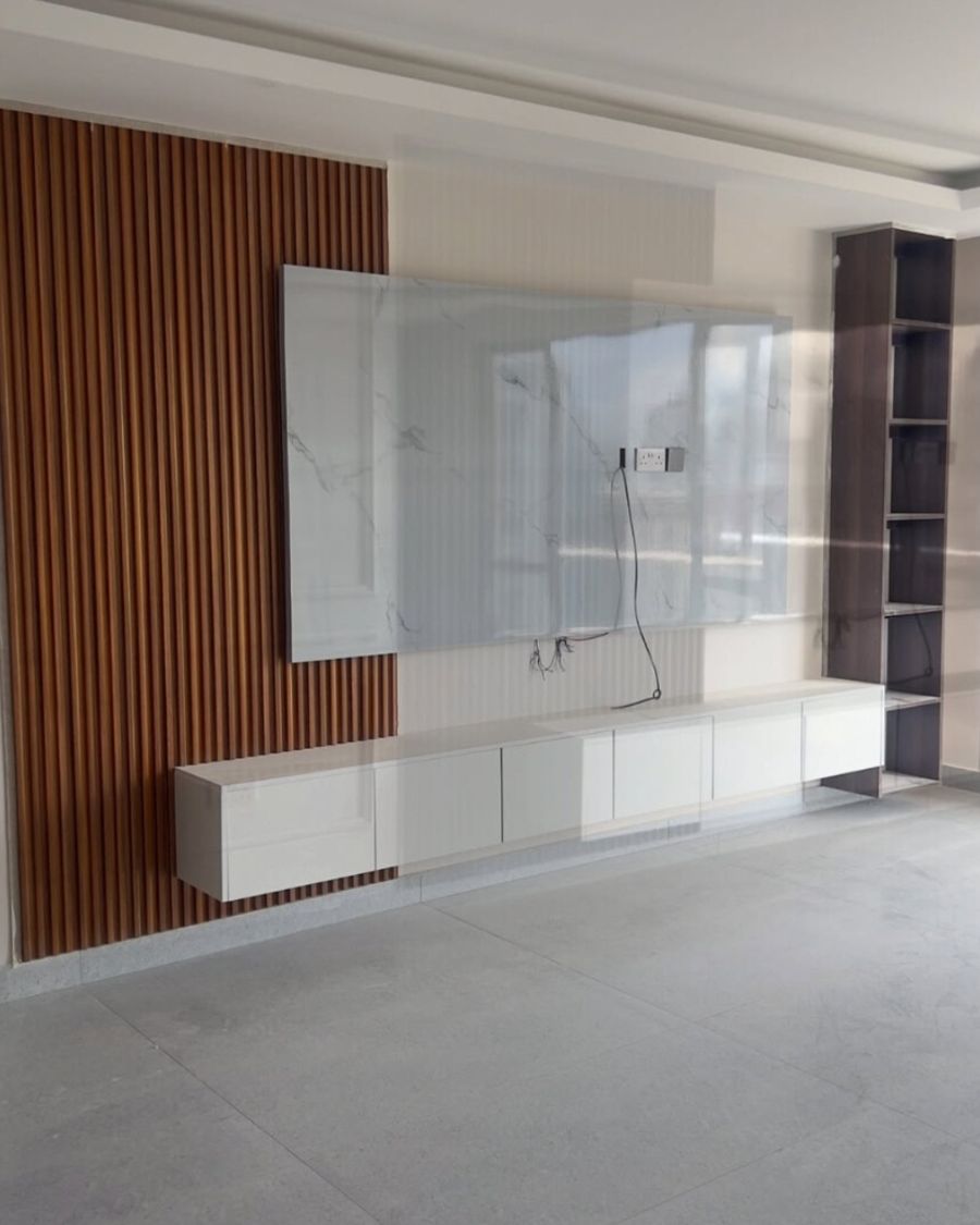 Timber slat wall with marble panel and floating console